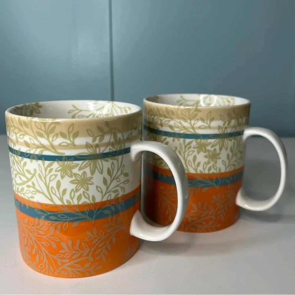 Starbucks 2008 Set of 2 Leaves Branches Blue & Orange Mugs. 14 oz.
